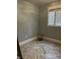 Bright and airy room with tile flooring, a window, and ample natural light at 4760 Winterberry Pl, Columbus, IN 47201