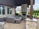 Inviting backyard features an outdoor kitchen, fireplace, and comfortable seating for gatherings at 4931 Kerrington Blvd, Bargersville, IN 46106