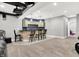 Finished basement featuring a wet bar with pendant lights and an adjacent workout room at 4931 Kerrington Blvd, Bargersville, IN 46106