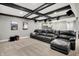 Basement boasts a large sectional sofa, a home theater system, and ample room for entertainment at 4931 Kerrington Blvd, Bargersville, IN 46106