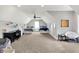 Large bedroom with a chair, desk, and two beds with patterned comforters at 4931 Kerrington Blvd, Bargersville, IN 46106