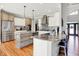 Bright kitchen with stainless appliances, granite countertops, and a large island for modern cooking and entertaining at 4931 Kerrington Blvd, Bargersville, IN 46106