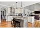 Spacious kitchen with granite counters, stainless appliances, seating at the island, and eat in dining area at 4931 Kerrington Blvd, Bargersville, IN 46106