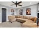 A comfortable room features a large sectional sofa and stylish decor, perfect for relaxation at 4931 Kerrington Blvd, Bargersville, IN 46106
