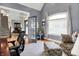 Bright home office with hardwood floors, neutral colors, and lots of natural light at 4931 Kerrington Blvd, Bargersville, IN 46106