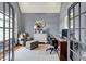 Cozy home office featuring an accent chair, modern desk, and ample storage space at 4931 Kerrington Blvd, Bargersville, IN 46106