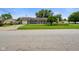 Inviting single-story home with a well-manicured lawn and charming curb appeal at 50 Crestview Dr, Greenwood, IN 46143