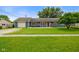 Well-kept single-story home with a large front lawn and attached garage at 50 Crestview Dr, Greenwood, IN 46143