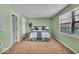 Serene bedroom featuring a large window, neutral walls and plush carpet flooring at 5010 Donner Ln, Indianapolis, IN 46268