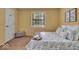 Comfortable bedroom with a well-decorated bed, soft carpet, and natural light at 5010 Donner Ln, Indianapolis, IN 46268