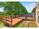 Outdoor deck with built-in seating and a charming gazebo, perfect for entertaining at 5010 Donner Ln, Indianapolis, IN 46268