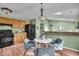 Charming kitchen features ample cabinetry, stainless appliances, and an adjacent breakfast nook at 5010 Donner Ln, Indianapolis, IN 46268