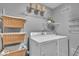 A practical laundry room featuring modern appliances and ample storage at 5010 Donner Ln, Indianapolis, IN 46268