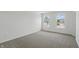 Bright bedroom with carpeted floors and double windows at 5763 Greenbrier Ct, Brownsburg, IN 46112