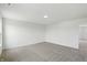 Neutral bonus room featuring new carpet and recessed lighting at 5763 Greenbrier Ct, Brownsburg, IN 46112