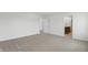 Bedroom with neutral carpet and view to the adjacent bathroom at 5763 Greenbrier Ct, Brownsburg, IN 46112
