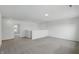 Neutral bonus room featuring new carpet, recessed lighting, and an open floor plan at 5763 Greenbrier Ct, Brownsburg, IN 46112