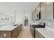 Bright kitchen showcases an open layout with modern appliances, plenty of cabinet space, and stylish countertops at 5763 Greenbrier Ct, Brownsburg, IN 46112