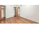 Bedroom with wood floors, closet and interior doors at 5841 N Parker Ave, Indianapolis, IN 46220