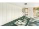 Enclosed sunroom with natural light and access to the exterior at 5841 N Parker Ave, Indianapolis, IN 46220