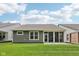 This home features a lovely lawn and a screened-in patio for enjoying the outdoors at 624 Faudree Dr, Westfield, IN 46074