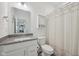 Clean bathroom with shower featuring a shower curtain, toilet, and vanity at 624 Faudree Dr, Westfield, IN 46074