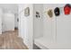 Hallway with coat hooks, decorative items, and access to other rooms at 624 Faudree Dr, Westfield, IN 46074