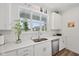 Kitchen featuring undermount sink, stainless steel appliances, and white backsplash at 624 Faudree Dr, Westfield, IN 46074