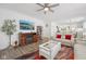 Spacious living room with wood-look floors, a fireplace, and comfortable seating at 624 Faudree Dr, Westfield, IN 46074