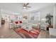 Open living room featuring wood-look flooring, stylish furniture, and plenty of natural light at 624 Faudree Dr, Westfield, IN 46074