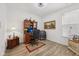 Functional home office features a desk, chair, and natural light from a window at 624 Faudree Dr, Westfield, IN 46074