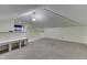 Attic space with carpet and unique ceiling at 629 S Miller St, Shelbyville, IN 46176