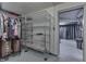 Finished basement with closet, shelving and doorway to storage area at 629 S Miller St, Shelbyville, IN 46176