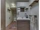 Quaint bathroom featuring a modern vanity, textured walls, and unique design elements at 629 S Miller St, Shelbyville, IN 46176