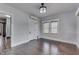 A well lit bedroom with natural light and classic wooden flooring at 629 S Miller St, Shelbyville, IN 46176