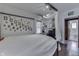 Bright bedroom features a canopy bed, hardwood floors, and ample decorations at 629 S Miller St, Shelbyville, IN 46176