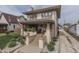 Inviting exterior of a two-story home with a welcoming front porch and manicured landscaping at 629 S Miller St, Shelbyville, IN 46176