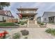 Attractive two-story home featuring a well-manicured front yard and welcoming entrance at 629 S Miller St, Shelbyville, IN 46176