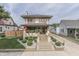 Charming two-story home featuring landscaped yard and inviting front porch at 629 S Miller St, Shelbyville, IN 46176