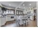 Beautiful kitchen with stainless steel appliances, island seating, and bright lighting at 629 S Miller St, Shelbyville, IN 46176