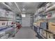 Organized storage room with metal shelving units filled with various containers and household items at 629 S Miller St, Shelbyville, IN 46176