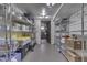 Bright storage room with shelves stocked with containers and household supplies at 629 S Miller St, Shelbyville, IN 46176
