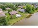 Aerial view of backyard showcasing an in-ground pool with pond access at 6629 Woodcrest Dr, Avon, IN 46123