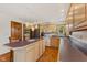 Spacious kitchen featuring stainless steel appliances and custom wood cabinets offering ample storage at 6629 Woodcrest Dr, Avon, IN 46123