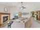 Inviting living room with a fireplace and vaulted ceilings creating an airy and cozy atmosphere at 6629 Woodcrest Dr, Avon, IN 46123