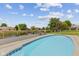 Enjoy the backyard views of the pond from the in-ground pool and deck area at 6629 Woodcrest Dr, Avon, IN 46123