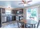 Well-equipped kitchen features stainless appliances and adjacent eat in space at 6635 Blackthorn Dr, Indianapolis, IN 46221