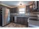 Stylish kitchen with stainless steel appliances, ample storage, and sleek countertops for meal prep at 6635 Blackthorn Dr, Indianapolis, IN 46221