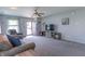 Cozy living room with ample natural light, plush seating, and convenient access to the front door at 6635 Blackthorn Dr, Indianapolis, IN 46221