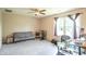 Versatile office space with a sofa, carpet floors and natural light from a window at 6635 Blackthorn Dr, Indianapolis, IN 46221